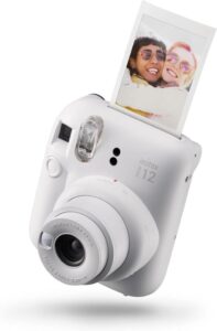 INSTAX Mini 12 Sofortbildkamera Clay-White - Die perfekte Kamera für lebendige, brillante Sofortbilder